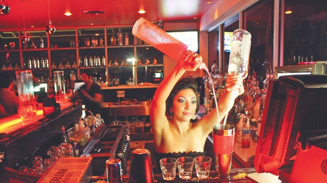 Bartender Nicole Gonzalez demonstrates the long pour at Area 31.