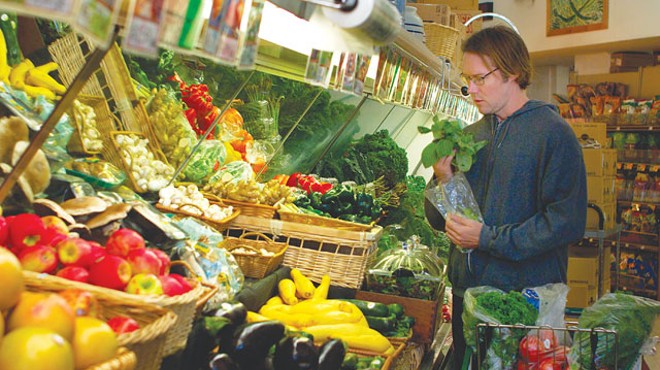 Bill (Paul Gordon) grocery shopping in The Happy Poet.