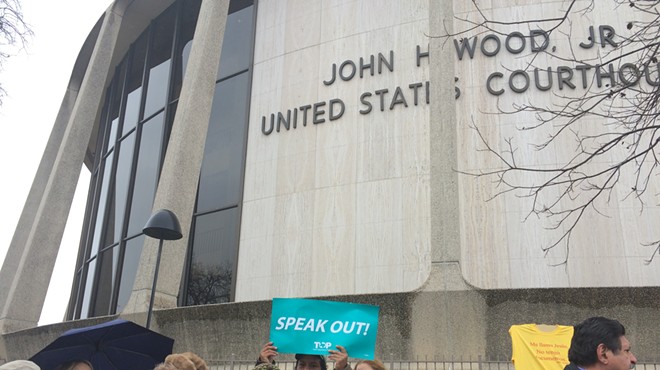 Members of the the Texas Organizing Project, Service Employees International Union of Texas, and Domesticas Unidas gathered at the John H. Wood Federal Courthouse Building on January 14, 2015, to oppose Governor-elect Greg Abbott lawsuit against President Barack Obama's executive action on immigration.