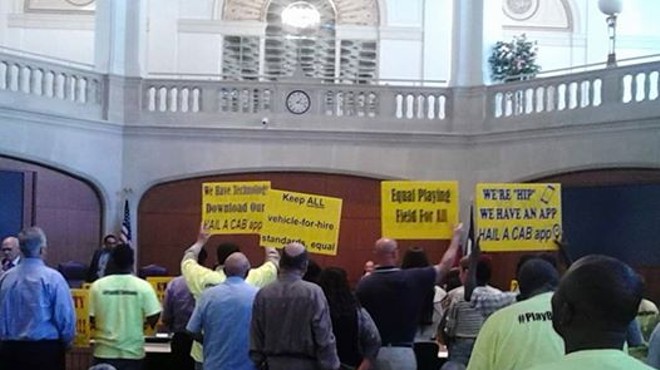 Opponents of the ride-sharing companies Uber and Lyft protested in City Council chambers earlier this year, prompting Public Safety Committee members to postpone moving rules that would allow the companies to operate in San Antonio to the full City Council while another task force studies proposed rules.