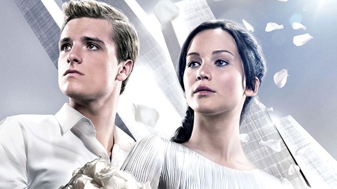 The Dating Games: Katniss (Jennifer Lawrence) and Peeta (Josh Hutcherson) try to keep up appearances