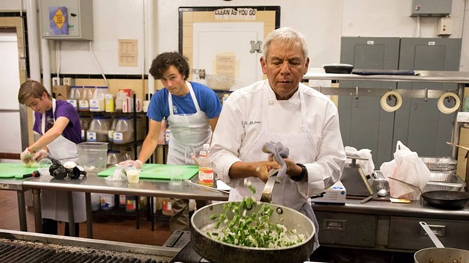Adán Medrano cooks up some nopales in the kitchen.