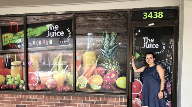 Aguirre in front of The Juice Experiment which opens this August.