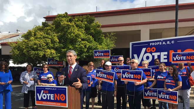 Mayor Ron Nirenberg speaks at the Go Vote No presser, surrounded by local Democrats.