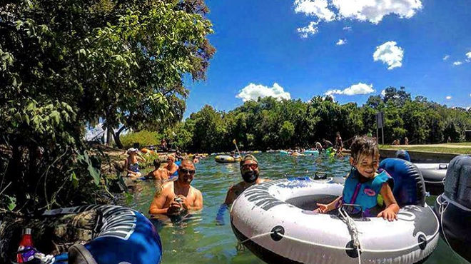 Tubers enjoy sun and suds on New Braunfels' Comal River.