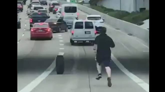 This Dude Seriously Ran After His Tire in the Middle of Traffic on a Houston Highway