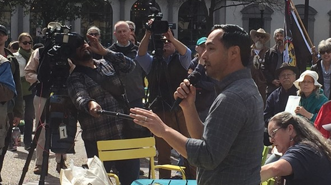 Newly bearded Joaquin Castro speaks to a crowd at a recent immigration rally in San Antonio.