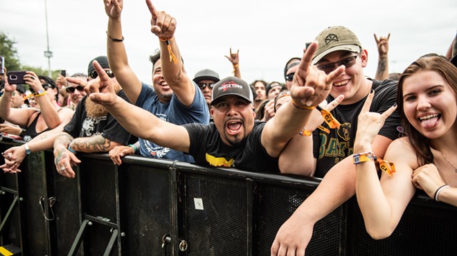 Fans at the barricade go crazy at a recent River City Rockfest.