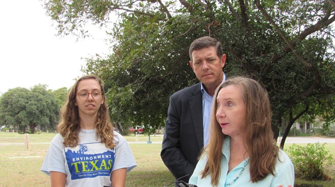 Annalisa Peace of the Greater Edwards Aquifer Alliance speaks as Anna Farrell-Sherman (left) of Environment Texas and Joseph Fitzsimons, founder of the Texas Coalition for State Parks, look on.