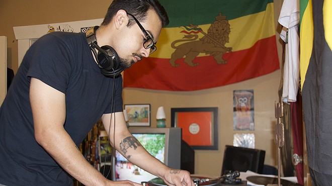 Josh Lucio of Four Hands spinning dub at home.