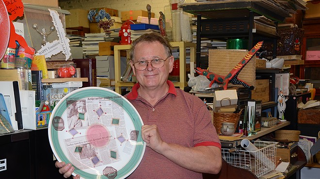 Gene Elder with one of his LGBT history plates.
