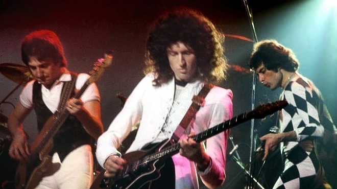 Queen's Brian May in mid-WWHhhaaaahhhhAAAAAHHHH!!!!