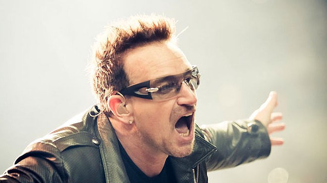 "Gimme some fookin' money for the homeless people, ya shite!" is what Bono is probably not saying.