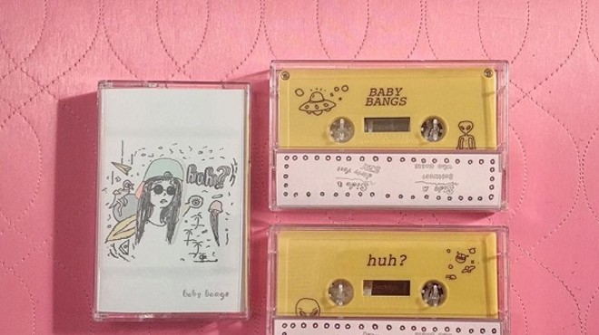 The cassette cover for Baby Bang's debut EP "huh?"