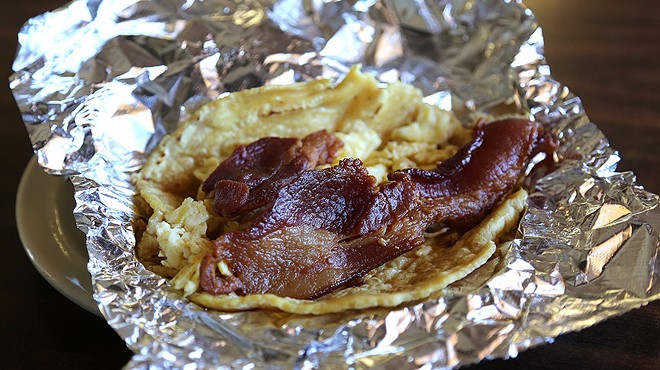 This bacon and egg on corn at Los Compadres is as good as breakfast tacos get.