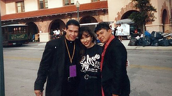 SA native Lupe Moreno with actors Jon Seda (left) and Jacob Vargas (right) at Sunset Station during shooting for the 1997 biopic Selena. Moreno, who auditioned for the title role, was instead hired as a stand-in and photo double for Jennifer Lopez.