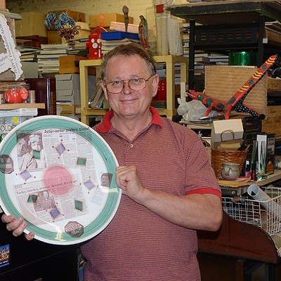 Gene Elder with one of his LGBT history plates.