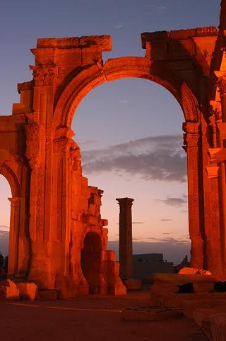 Sunrise over Palmyra’s Great Colonnade; looking through Triumphant Arch, Palmyra’s most recognizable landmark in 2007.
The arch was severely damaged by ISIS in September 2015.
