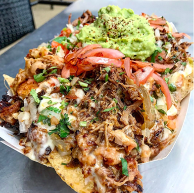 Sancho's
     628 Jackson St.,  (210) 320-1840,  sanchosmx.comThe nachos at Sanchos are served on a paper boat that somehow manages not to crumble under the weight of these fixin&#146;s. Refried borracho beans, Jack cheese, pico, and lightly grilled pickled onions are all part of the mix. Although these can be made vegan or vegetarian, stick with the carnitas, which feature a cinnamon-y bite.
    Photo via Instagram,  s.a.foodie