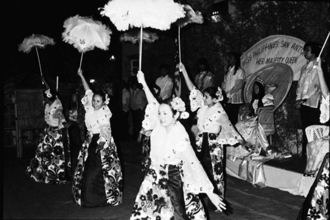 Filipino-American Association Dancers
Peep the queen in the back just living for the entertainment. This 1974 photo is just too cute.