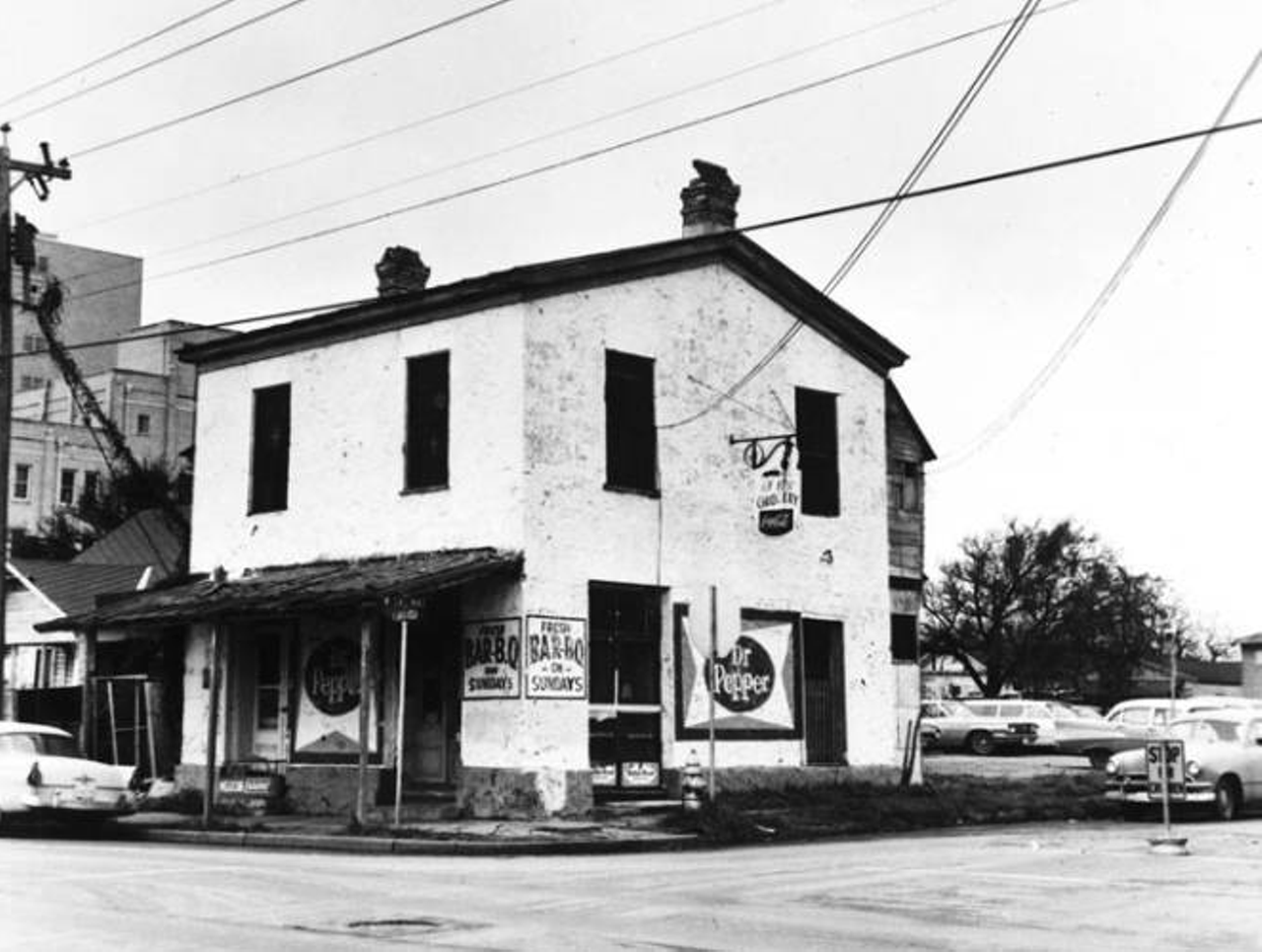 The '60s were definitely a time for mom-and-pop businesses. El Faro Grocery stood at 325 North Santa Rosa Avenue and was housed in a two-story 19th century limestone building. Check out the sign for the fresh bar-b-q on Sundays.