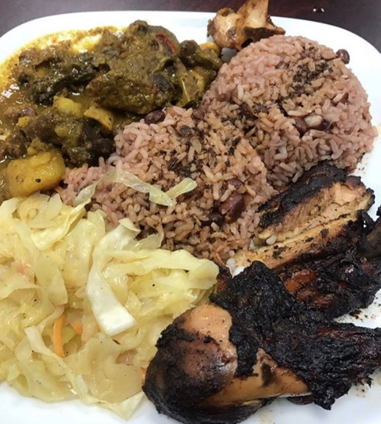 Jamaica Jamaica Cuisine
2026 Austin Hwy, /jamaicajamaicacuisine.com
A favorite for Carribbean fare, Jamaica Jamaica holds it down with its jerk chicken, curry goat, oxtails and more. There’s also vegetarian options! Now these folks even serve up brunch, and we’re so thankful.
Photo via Instagram / motiv8_mac