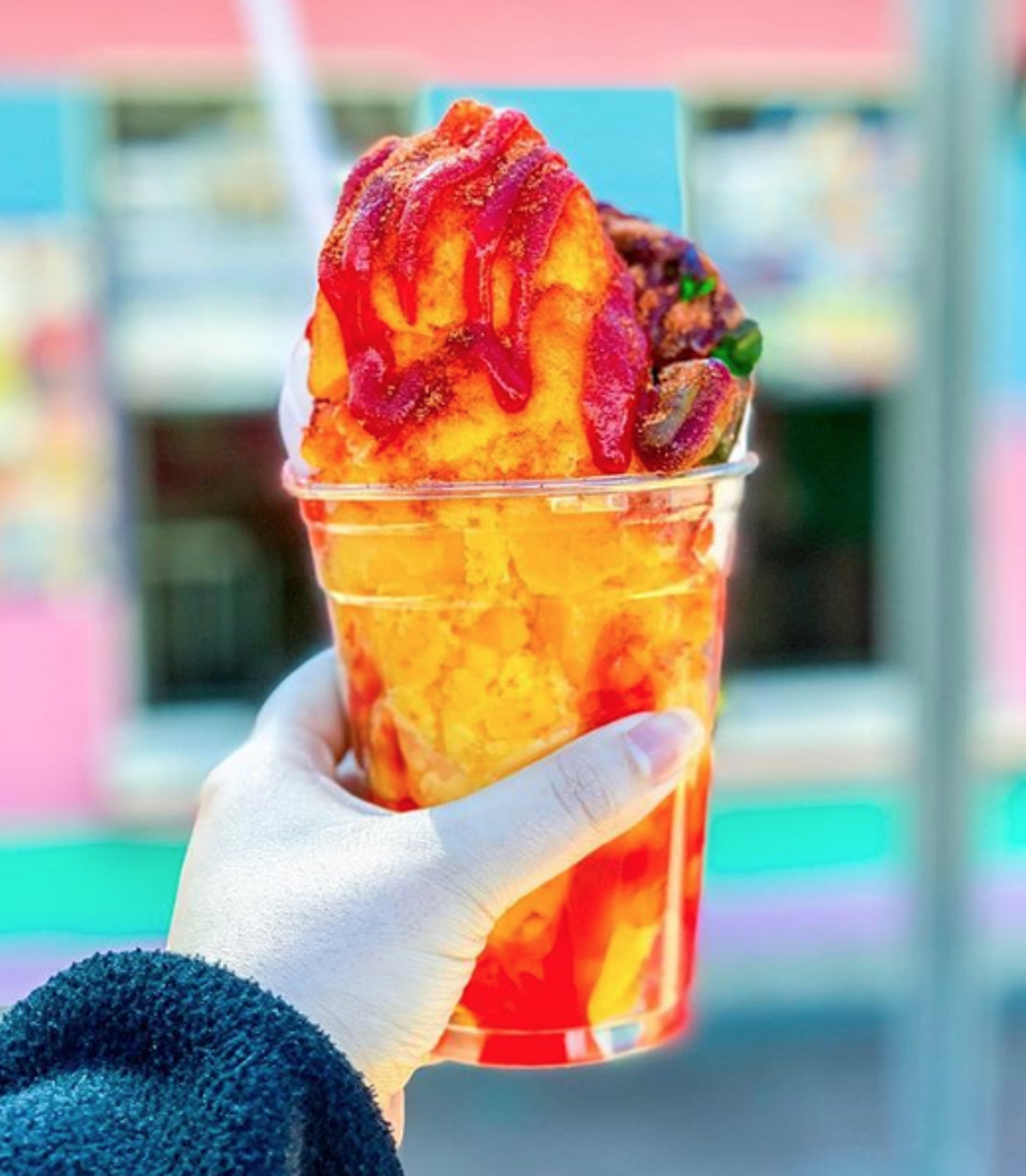 Mangonadas
Mangonadas are largely loved by Latinos, and San Antonio is known for getting the snack just right. Especially is the case for snack vendors who douse the treat in Tajin and chamoy to the point that the pica feels so, so good.
Photo via Instagram / stine.eats