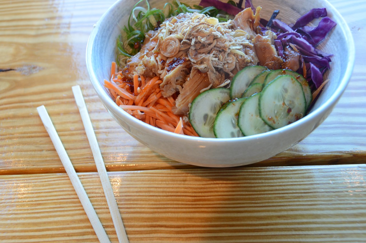 Noodle Tree chef Mike Nguyen recently launched a new lunch menu with caramel chicken and rice or noodles with scallions, carrots, red cabbage and cucumber.