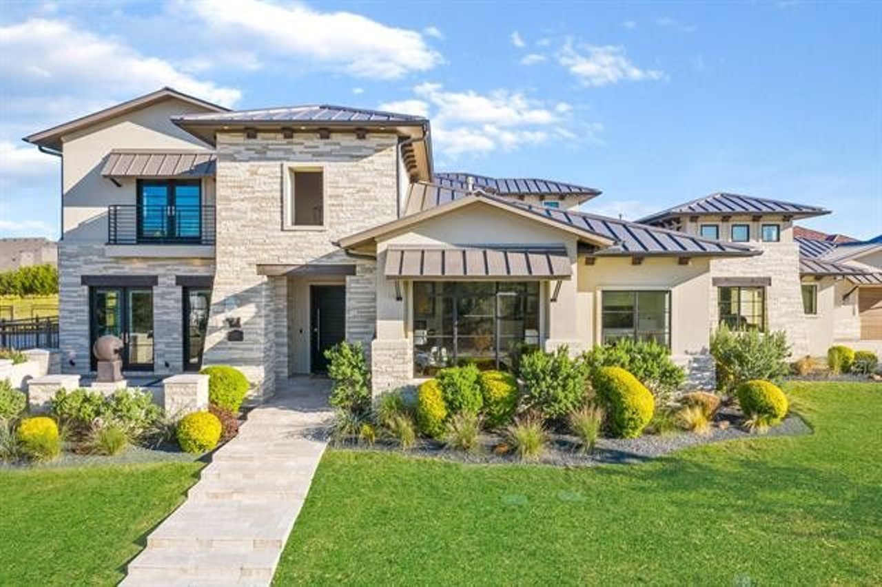 The 6,987-square-foot home sits inside a gated community in Frisco, north of Dallas.