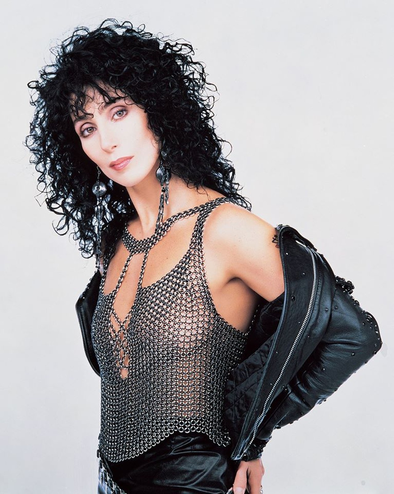 Yassssssss! '80s leather Cher with the curly hair. Okurrrrrt?!
Photo via Facebook / Cher