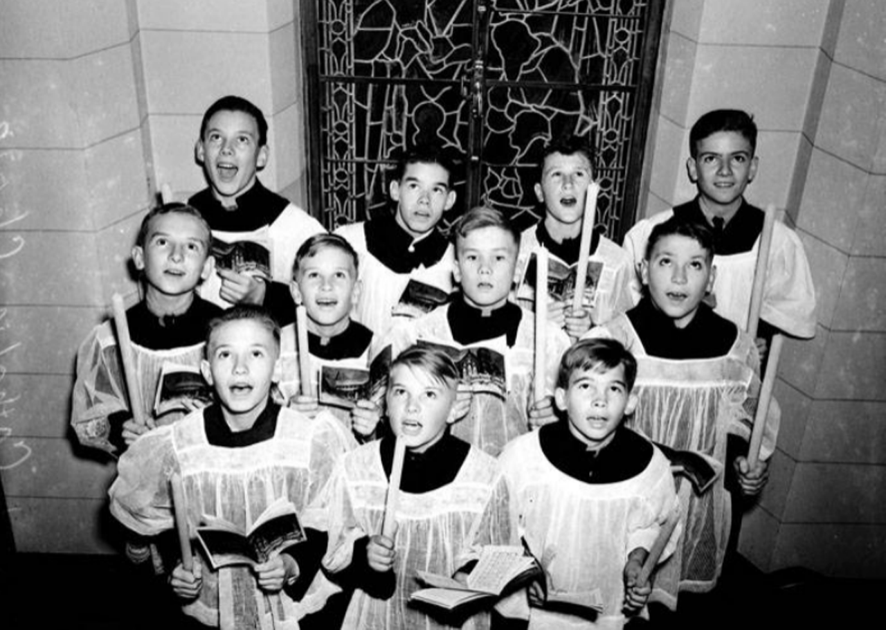 In this 1939 photo, you can see choir boys from Central Catholic High School. The boys, dressed in the traditional vestments, sung carols during the Christmas season to serenade folks downtown.