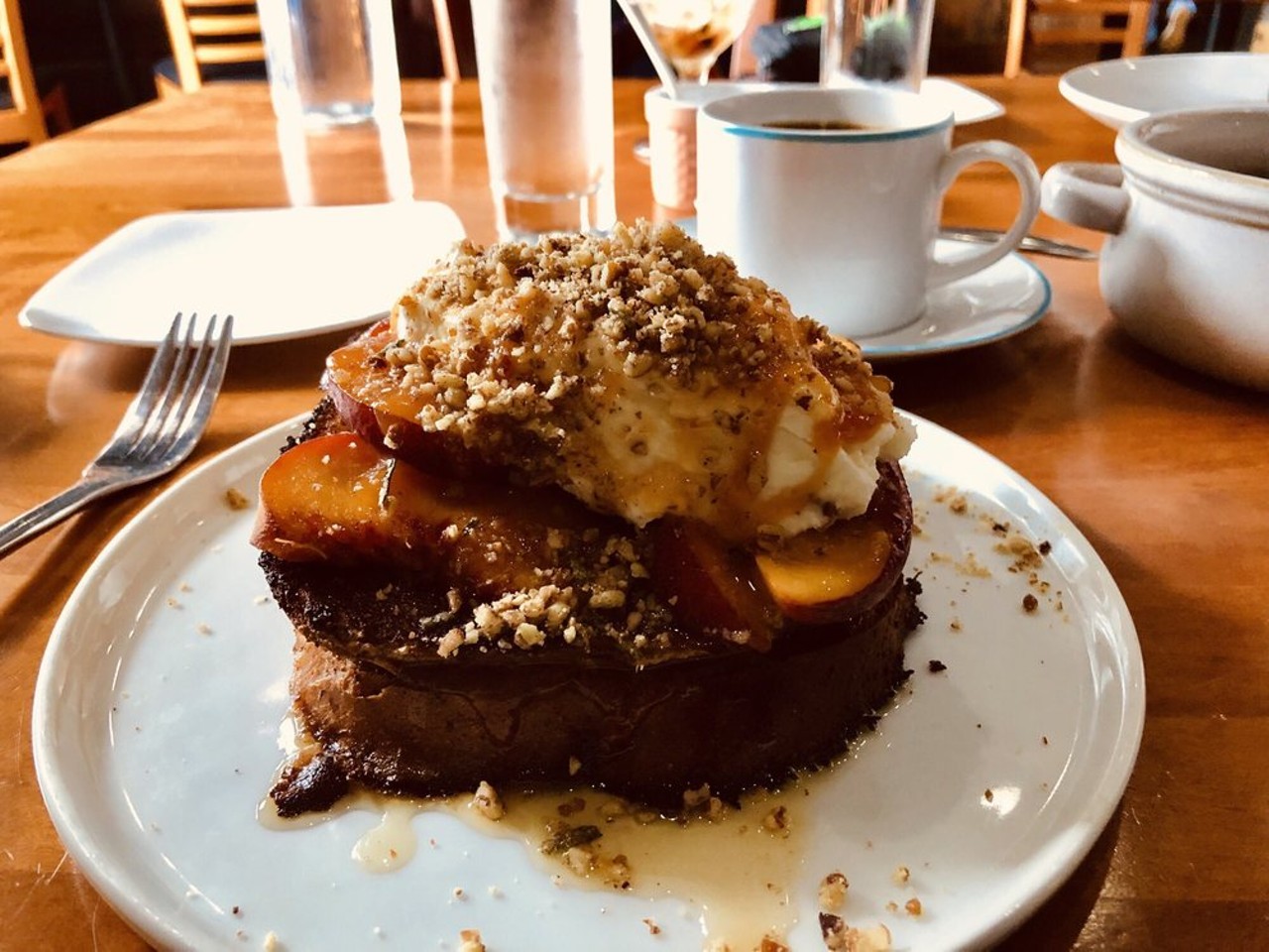 Meadow Neighborhood Eatery + Bar's peach french toast with fresh peaches on homemade bread... so delectable!