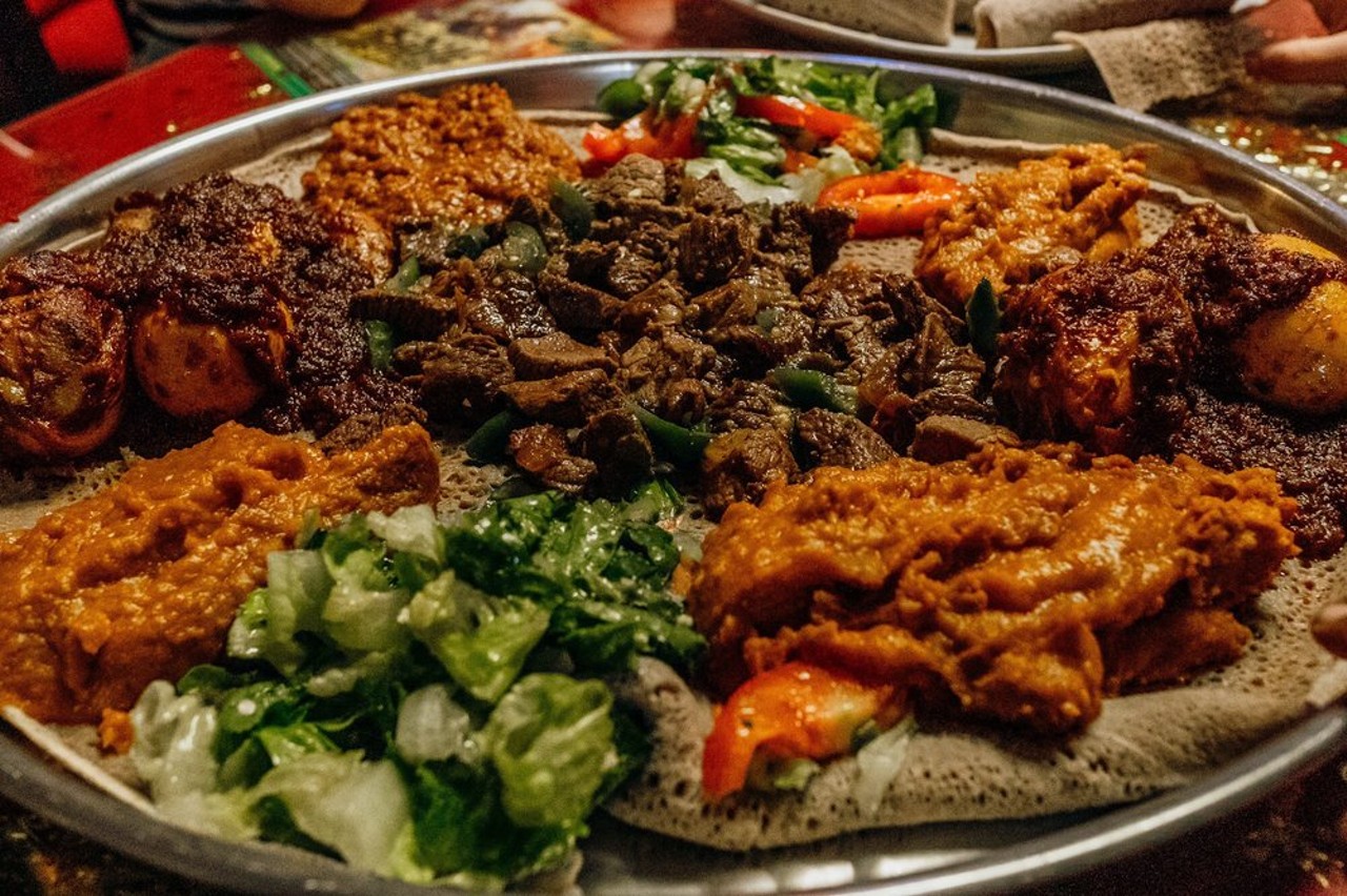 African Village
10918 Wurzbach Rd #131, (210) 467-5102, africanvillage.business.site
Whether you’re acquainted with any of the cuisines to come from the continent of Africa or not, you’ll be happy dining at African Village. Specializing in Ethiopian fare, the Wurzbach Road spot serves up dishes like kinche and firfir.
Photo via Yelp / Stephen M.