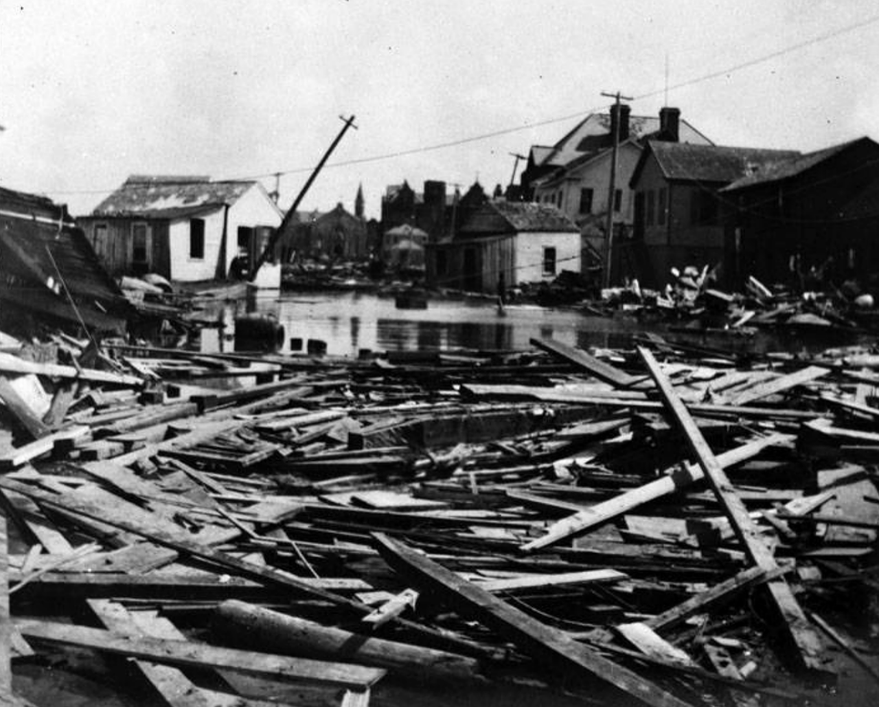 The worst natural disaster in U.S. history took place in Texas.
Galveston residents know that severe weather is all but unavoidable. Residents in the coastal town in 1900 saw major devastation when a Category 4 hurricane hit land on September 8. The storm completely wiped out the island city, bringing winds of 130 to 140 miles per hour and a storm surge of more than 15 feet. When the hurricane finally settled down, more than 8,000 people had died and thousands of buildings were destroyed. The storm left an estimated $700 million  in damages (in today’s currency).
Photo courtesy of San Antonio Conservation Society via UTSA Libraries Special Collections