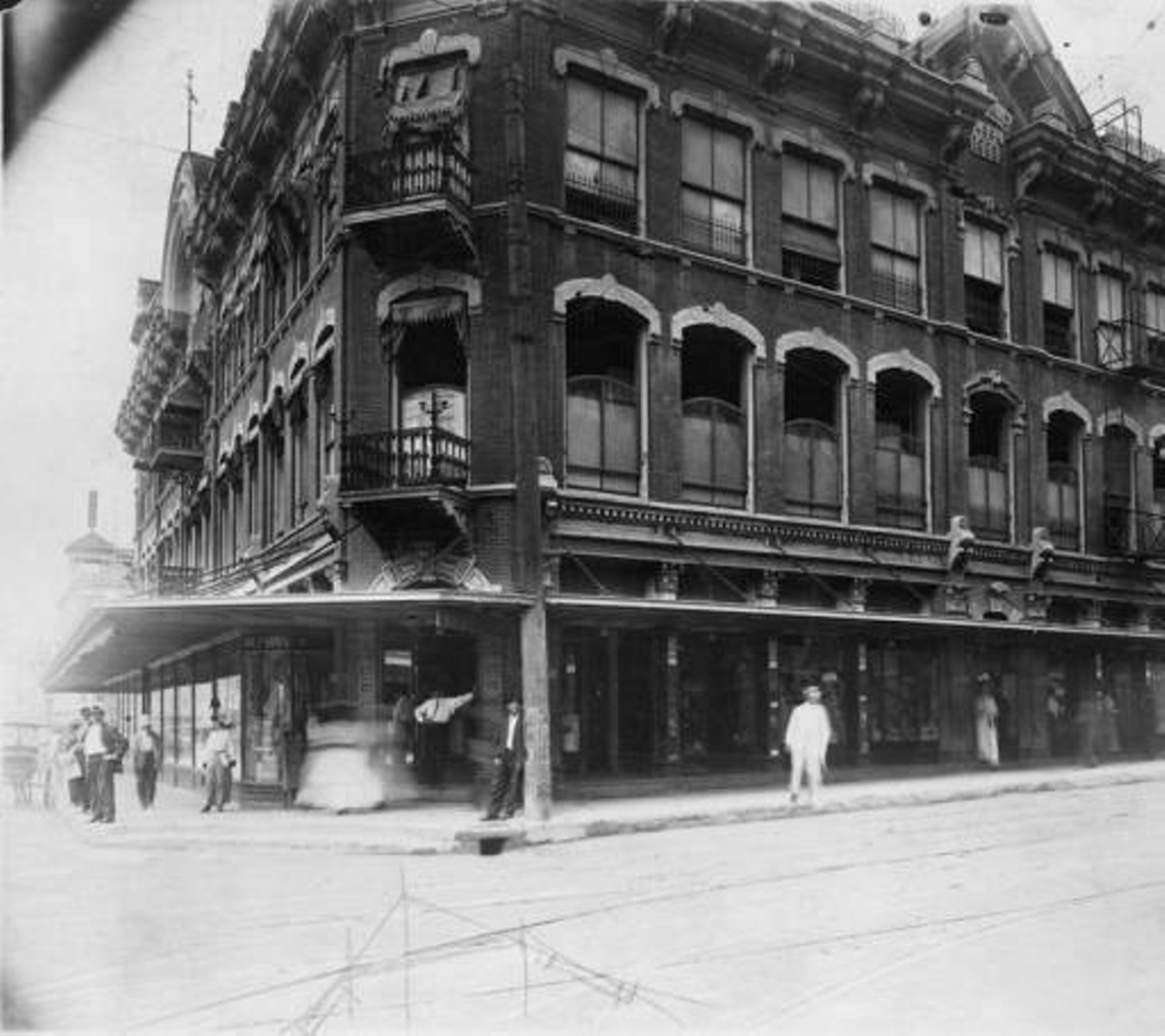 Circa 1913, The exterior of the Dullnig Building on the corner of East Commerce and North Alamo St.