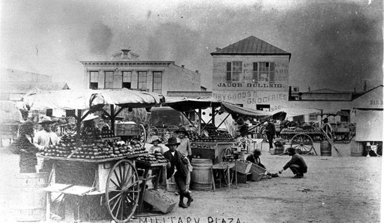 Vegetable stands on Military Plaza. Circa 1886. Photo by the UTSA Special Collections.