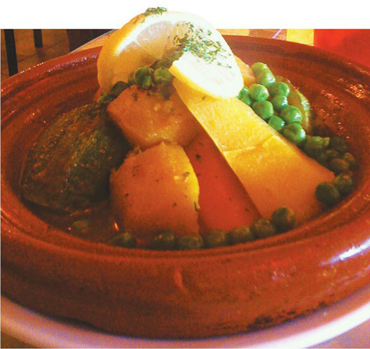 Vegetable tagine from Moroccan Bites
The pile of seasonal vegetables form a pyramid of squash, carrots, peas, and potatoes atop a pool of steaming hot broth. Simple, savory, and a touch peppery. 
Moroccan Bites, 5714 Evers Rd., (210) 706-9700, moroccanbitescuisine.com. 
Photo via San Antonio Current