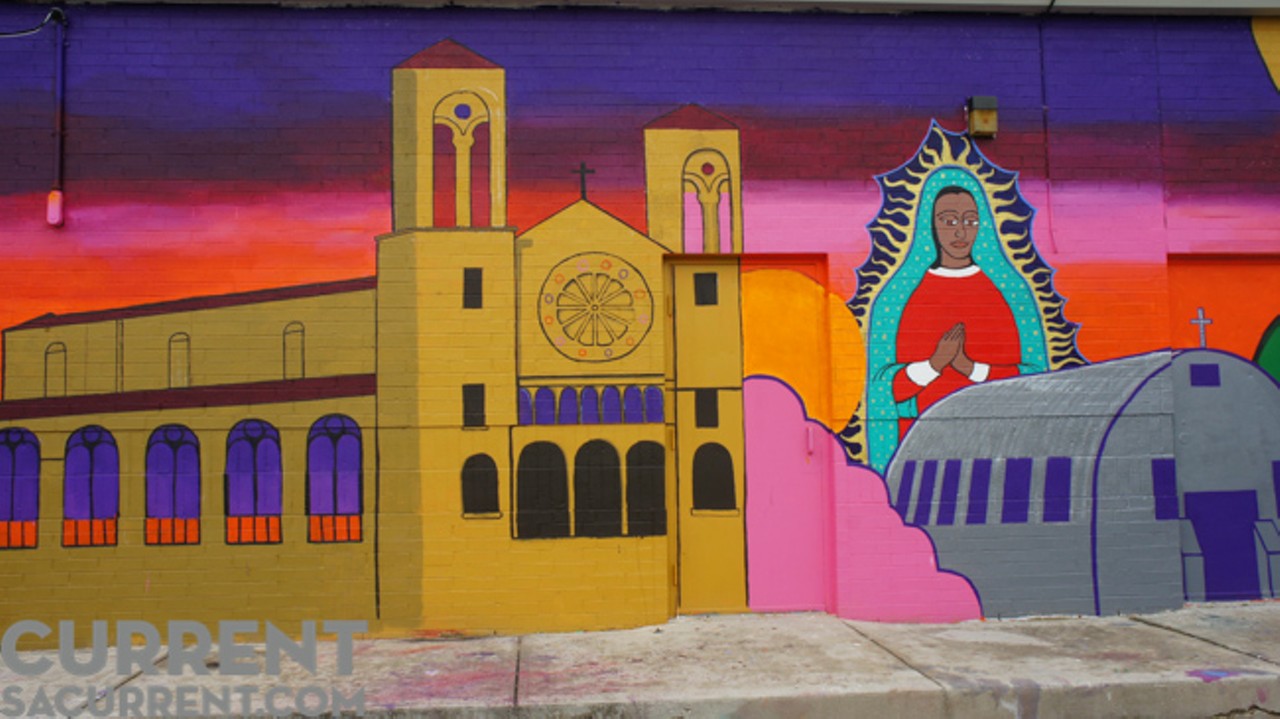 In one portion of the mural, the Virgin Mary overlooks St. Patrick Catholic Church, alongside Our Lady of Peace Catholic Church, a repurposed airplane hanger where blacks and hispanics used to worship during segregation.