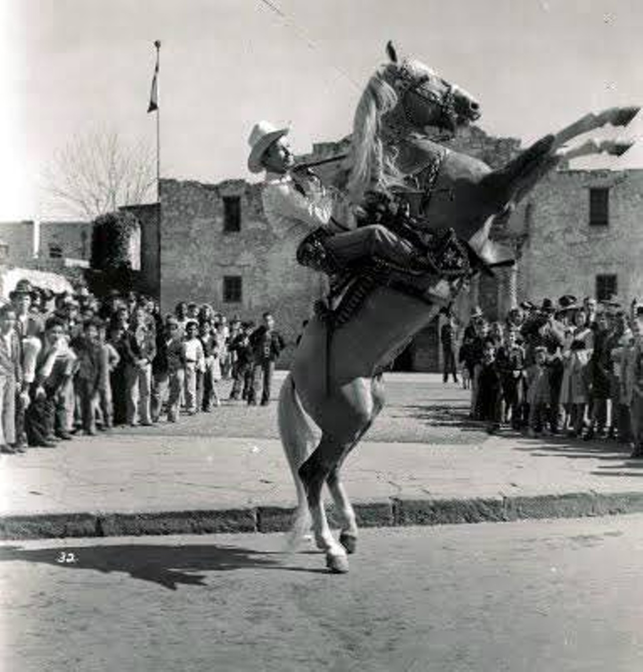 Roy and Trigger showing their classic form in front of the Alamo during a San Antonio visit to raise war bonds for WWII in 1943.