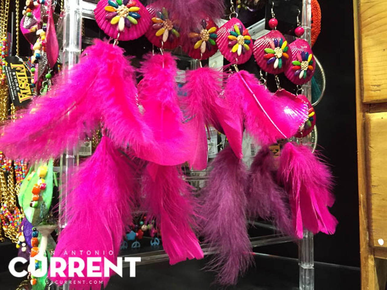 The doll hair clip will go really nice with this super pink feather earrings.