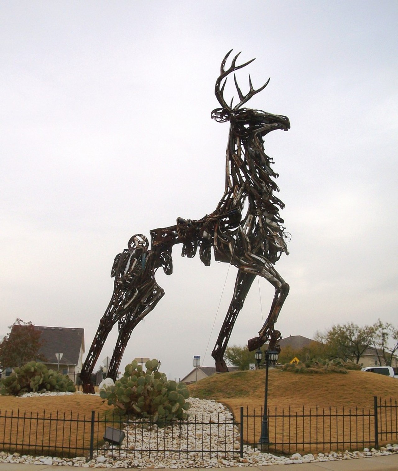 "King of the Parc"
4203 Loring Park, 210-310-2550 
A giant stag made of junk parts &#151; rusted fenders, license plates, typewriters &#151; stands as a centerpiece of a housing development named "The Parc at Escondido." The heroically posed stag was created by Mexico City sculptor Florentino Narcis, and remains a randomly cool photo opportunity outside of San Anto in Converse, Texas. 
Photo via kernut.com