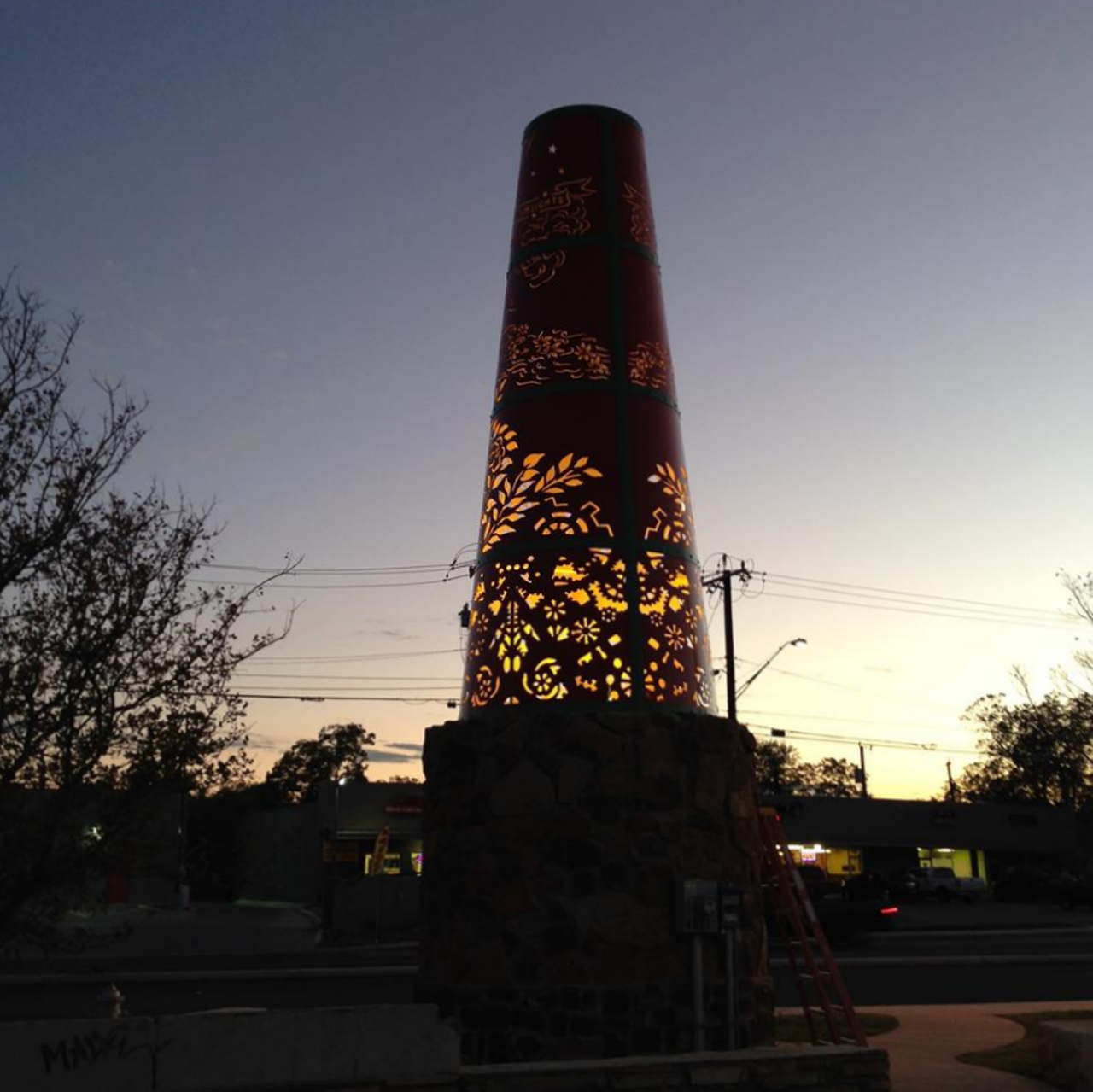 The Beacon
1700 Blanco Road
Artist: Angel Rodriguez-Diaz, 2008
This 28 ft. tall aluminum sculpture lights up at night similar to a luminaria, serving as a beacon at the intersection of Blanco Road and Fulton Street in the Beacon Hill neighborhood.
Facebook/Public Art San Antonio