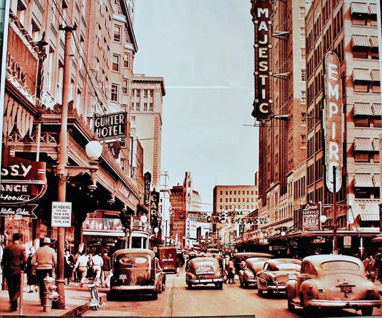 A postcard of Houston Street with the Gunter Hotel on the left, the Magic Theatre on the right, and the Medical Arts Building in the center.