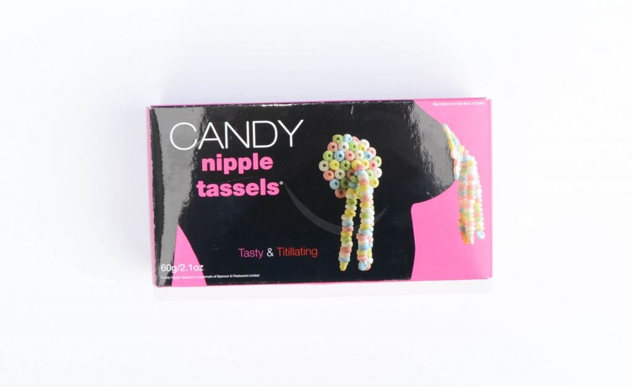 5. Candy Nipple Tassels
Cost: $8.99
Aroma: N/A
Taste: Chalky and nearly flavor-free
Functionality: The novelty tassels come with four adhesives &#151; two for each nipple &#151; so as to stick them on your anatomy. Actual warning on label: Not to be worn longer than 4 hours. Duly noted. 
Love Score: 1 heart