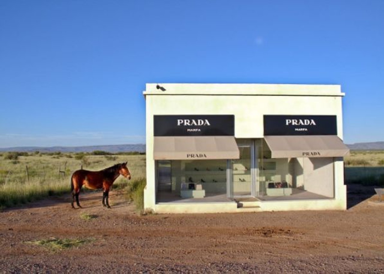 Prada Marfa 
Patrolled by ominous black vultures, this modern art project created in 2005 by Berlin-based artists Michael Elmgreen and Ingar Dragset is jarringly located by a railroad track stretching into the Chihuahuan desert. This sore thumb of a building was originally intended to decay over time to make a statement on consumerism, but vandals and graffitists have attempted to accelerate the process: spray-paint tags, tattoo parlor stickers and mysterious poetry carpet every available surface around the store. Such artificial interference is scrubbed away by artist and Valentine local Boyd Elder, whose painted animal skulls became famous as the centerpieces of cover art for the band The Eagles. Make sure to bring a padlock to hang on the fence behind the store--it&#146;s become something of a tradition. 
1.4 miles northwest of Valentine, TX on Highway 90, 79854
Photo via dustinzoey