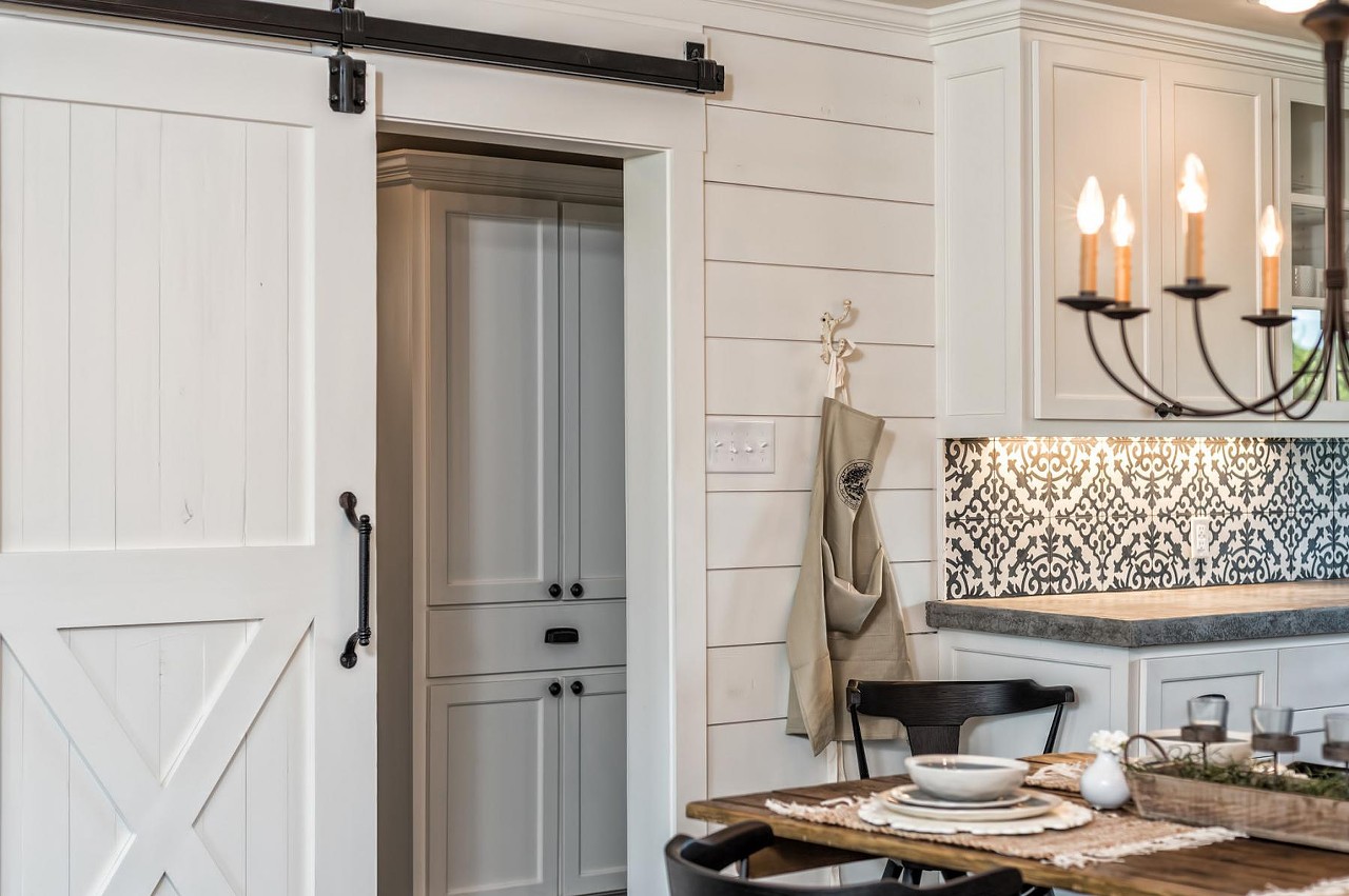 The barn-style doors add a touch of originality to this home.