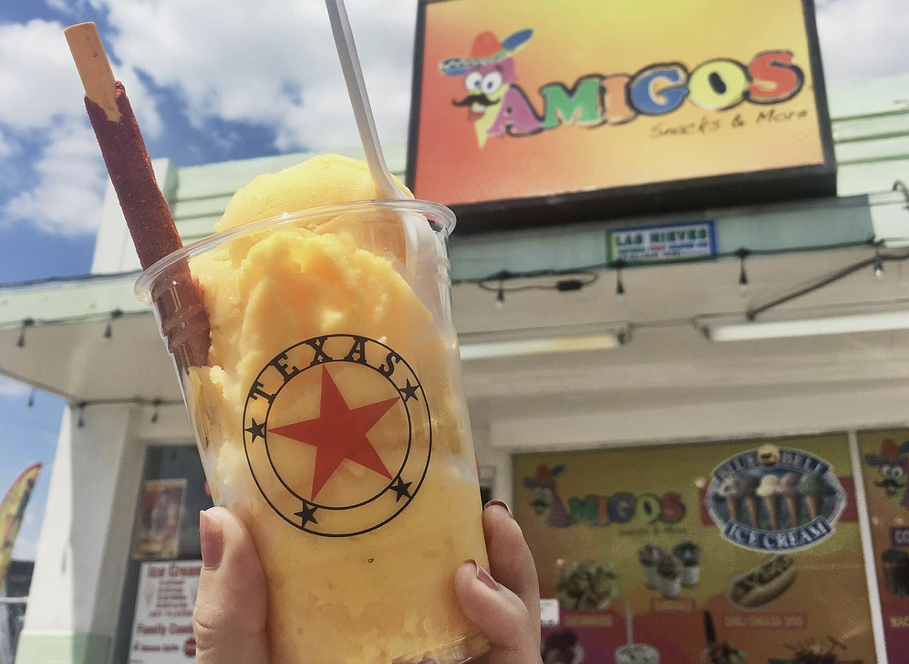 Mangonadas
San Antonio is known for getting mangonadas just right. This is especially the case for snack vendors who douse the treat in Tajin and chamoy to the point that the pica feels so, so good.
Photo via Instagram / hannahmayeats