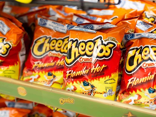 Flamin' Hot Cheetos
SA loves this dusty red spicy snack, and pairs it with just about everything. From Cheetos slathered with cheese to adorning burgers, hot dogs and even donuts, Hot Cheetos have made their mark on the Alamo City’s culinary scene.