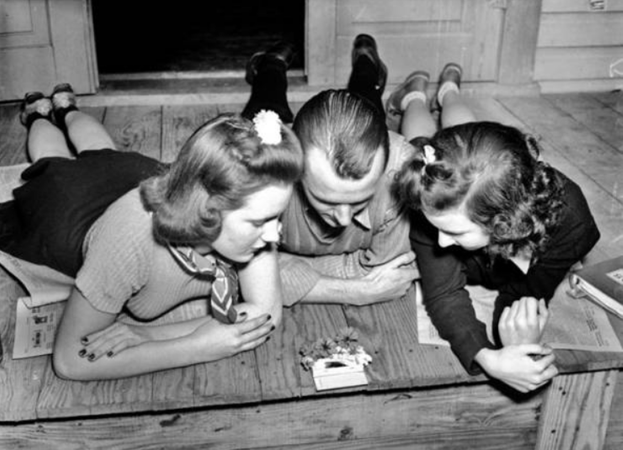 Nell Donnell, Tom Mock and Betsy would have for sure been modern-day hipsters. These San Antonio Junior College students are shown mourning the death of a cockroach in this 1939 picture. The college colors were at half mast in honor of the quirky campus mascot, "Razdover."