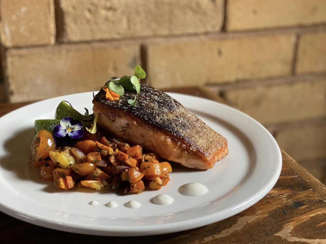 Cured
306 Pearl Pkwy #101, (210) 314-3929, curedatpearl.com
Indulge in a pan seared king salmon filet and butternut squash hash at this Pearl-area eatery for a Lenten-approved meal. 
Photo via Instagram / curedatpearl